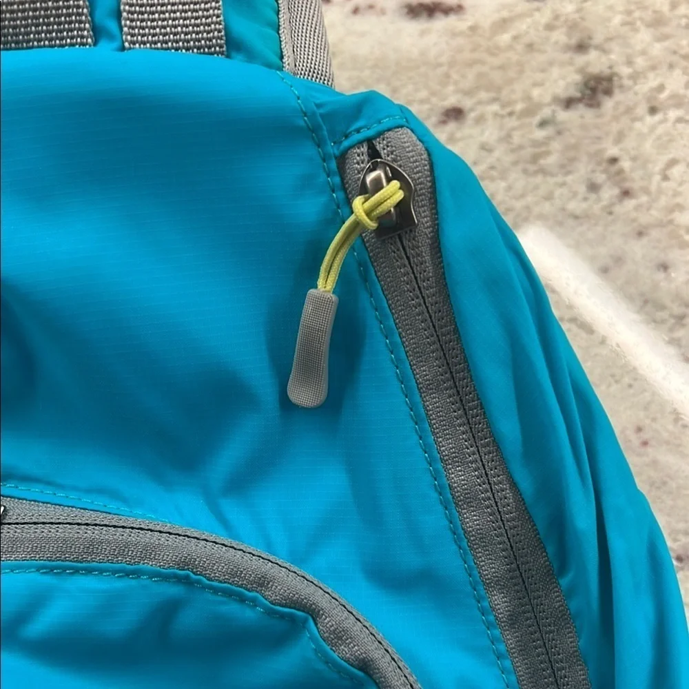Eddie Bauer Teal Sling Shoulder Bag Backpack Crossbody Bag Multiple Compartments